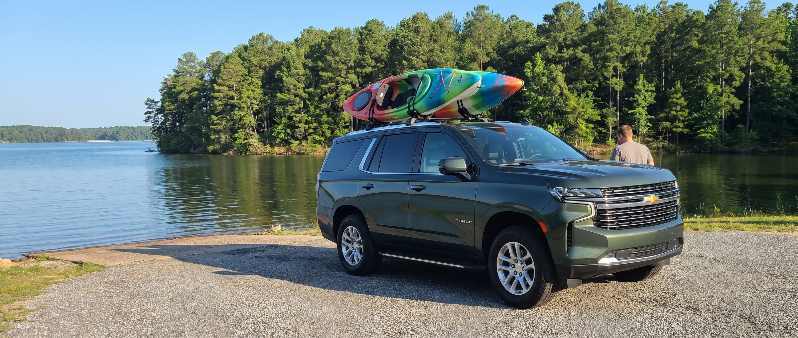 2026 Chevrolet Tahoe with kayaks on roof rails at Lake Wateree, SC boat launch